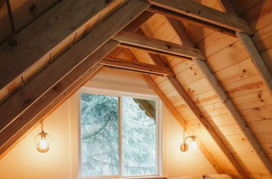 Attic fire protection using fireproofing compounds for wooden elements